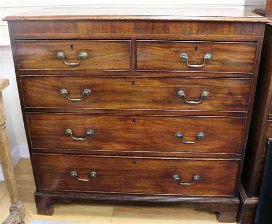 A George III mahogany chest with two short and three long drawers, L.105cm